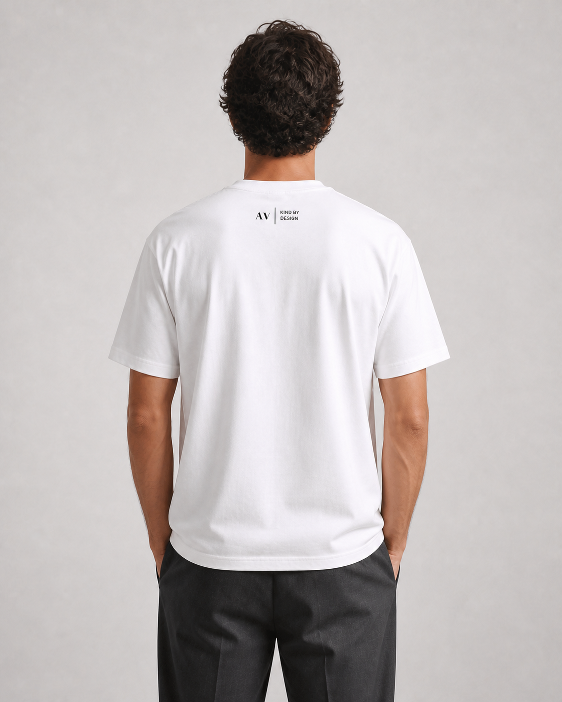 Back of the white Authentic Vegan Kind by Design T-shirt on a model